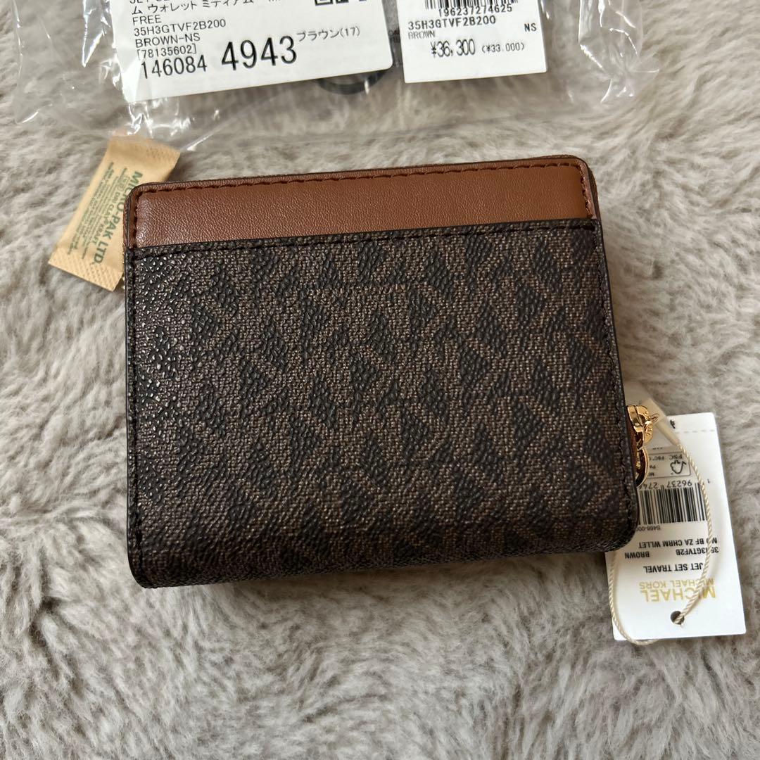最終値下⭐︎MICHEAL KORS 折り財布 ジップ チャーム ウォレット