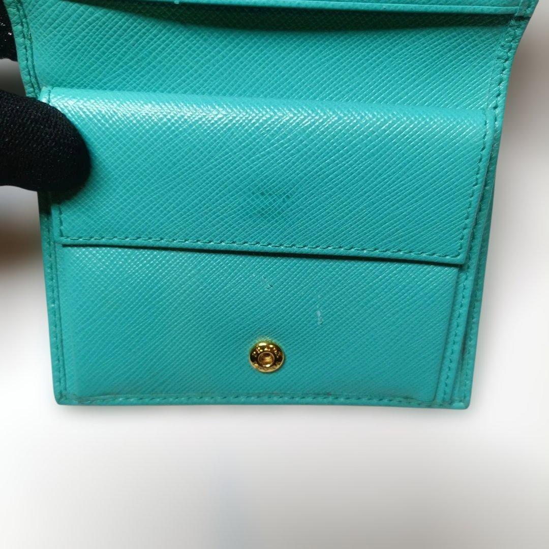 パ*ン様 PRADA ターコイズ 二つ折り財布