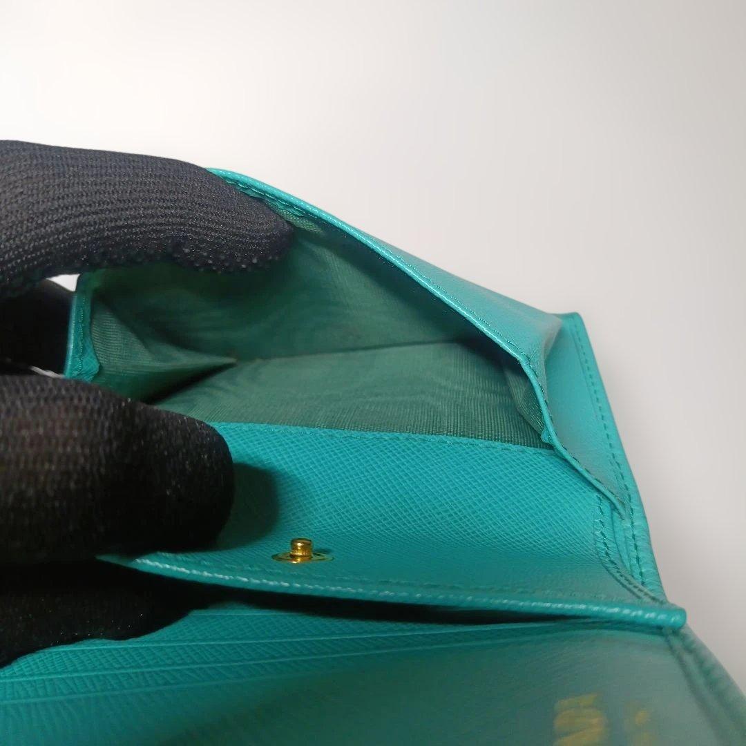 パ*ン様 PRADA ターコイズ 二つ折り財布