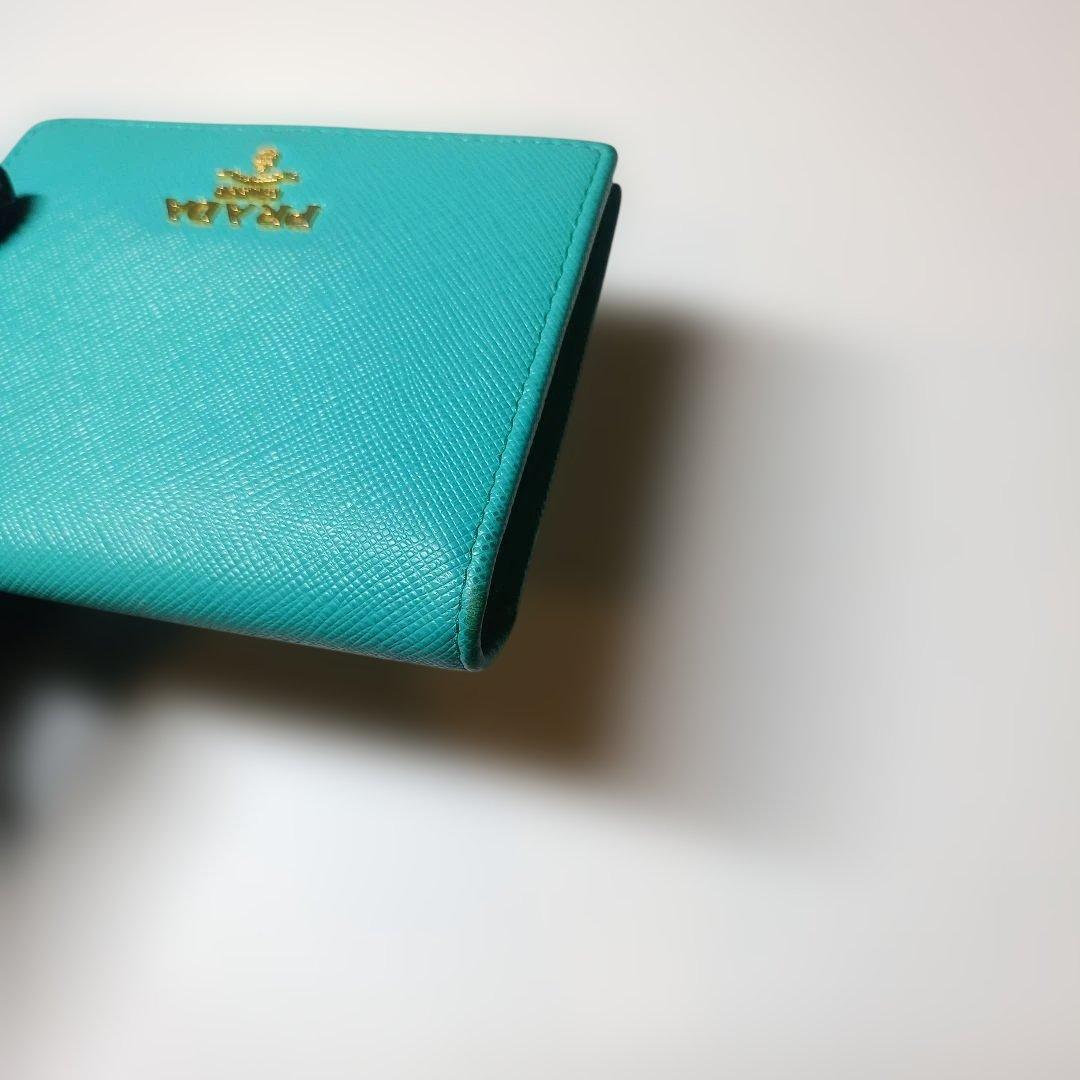 パ*ン様 PRADA ターコイズ 二つ折り財布
