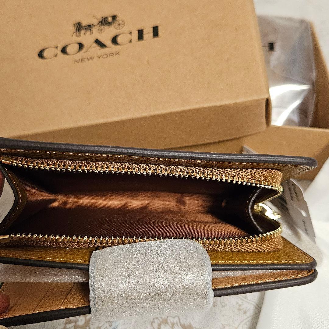 COACH スヌーピー柄 二つ折り財布 新品未使用 保存袋、箱付