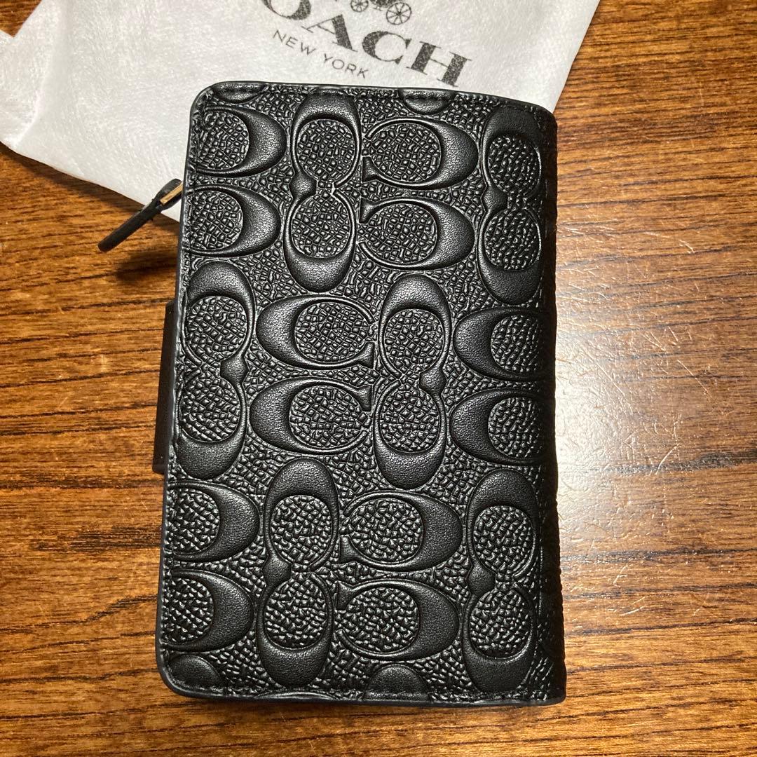 COACH ブラック 二つ折り財布 保存袋付き　ほぼ未使用品