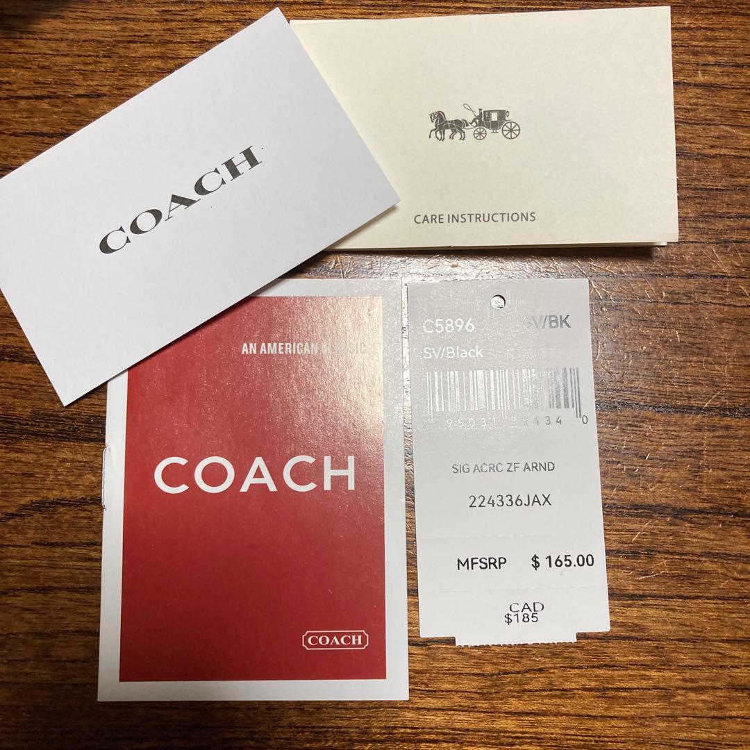 COACH ブラック 二つ折り財布 保存袋付き　ほぼ未使用品
