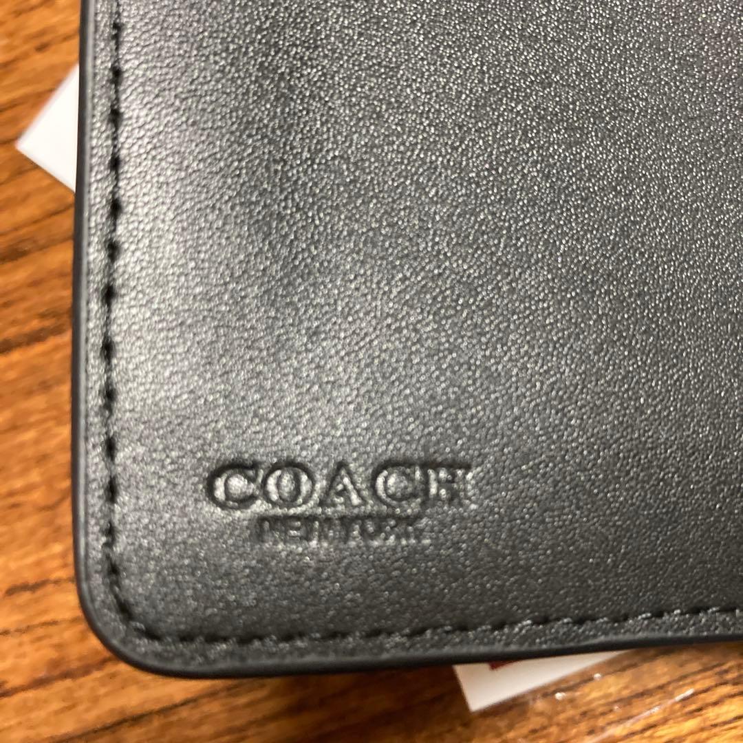 COACH ブラック 二つ折り財布 保存袋付き　ほぼ未使用品