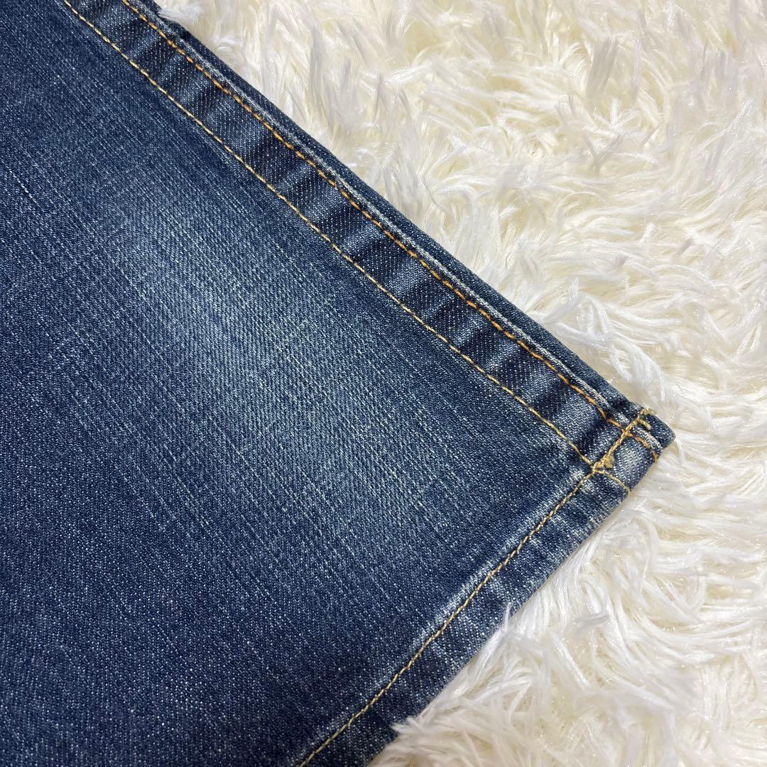 新品未使用　bebe ストーン装飾 ダークデニム ブーツカットパンツ　24