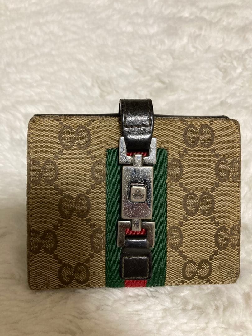 Gucci 二つ折り財布 金具付き