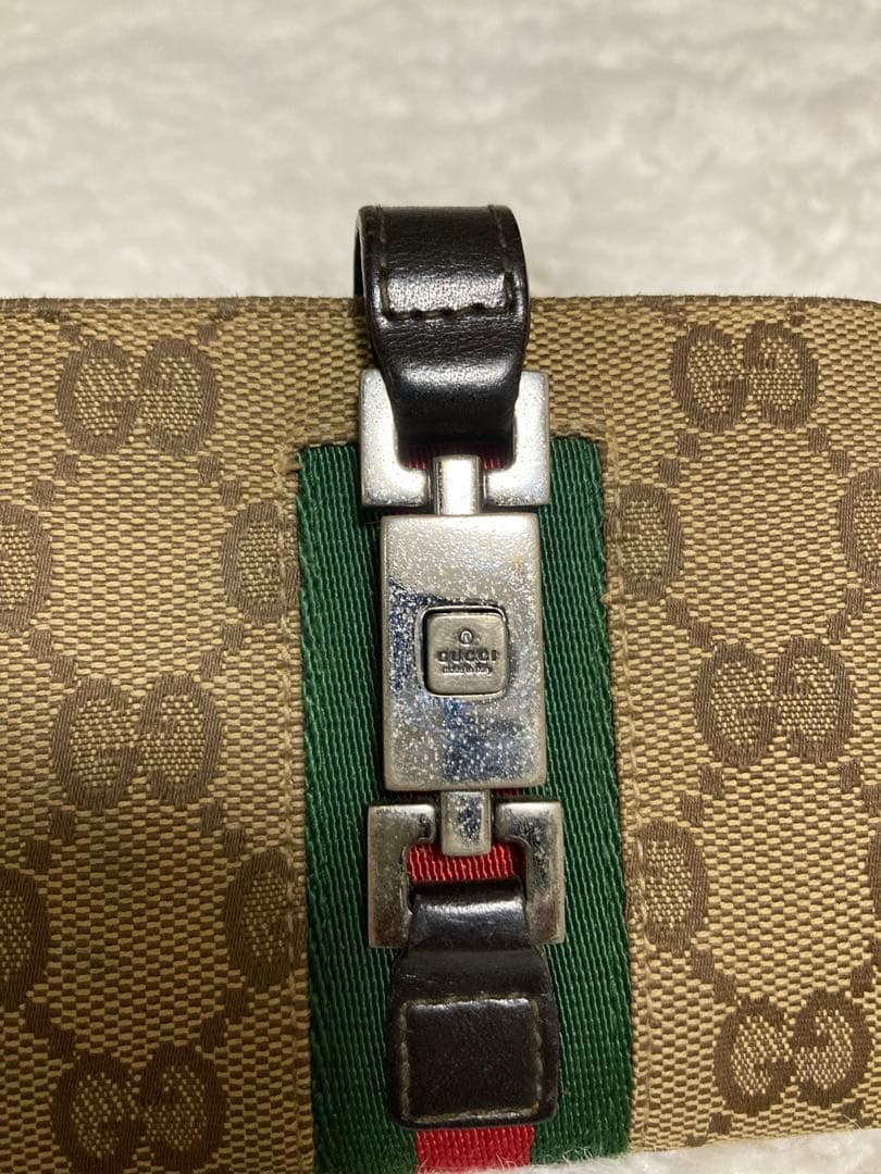 Gucci 二つ折り財布 金具付き