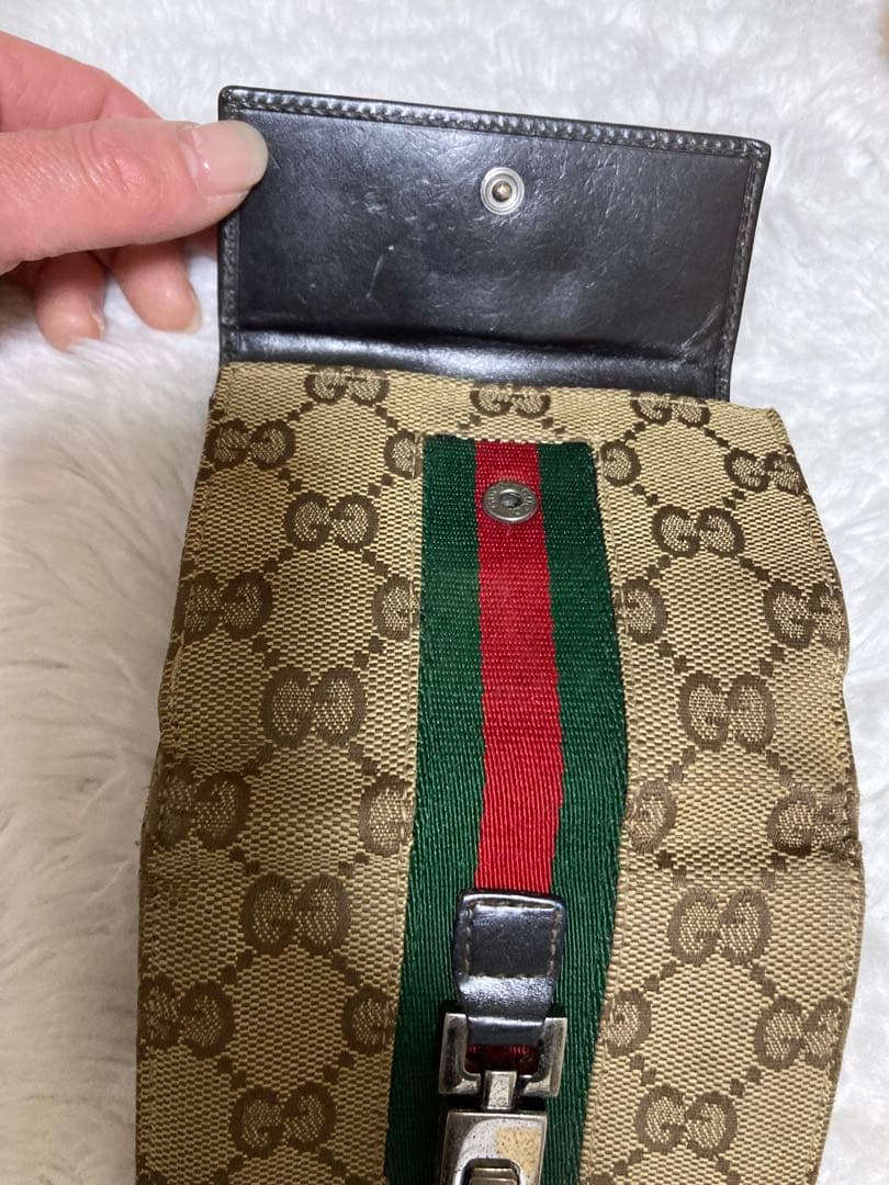 Gucci 二つ折り財布 金具付き