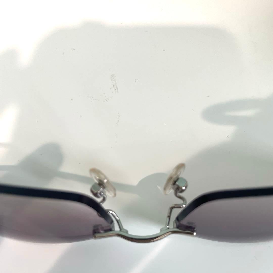 MIU MIU サングラス　紫色レンズ メタルフレーム ケース付き
