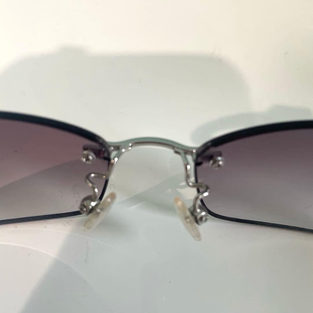 MIU MIU サングラス　紫色レンズ メタルフレーム ケース付き