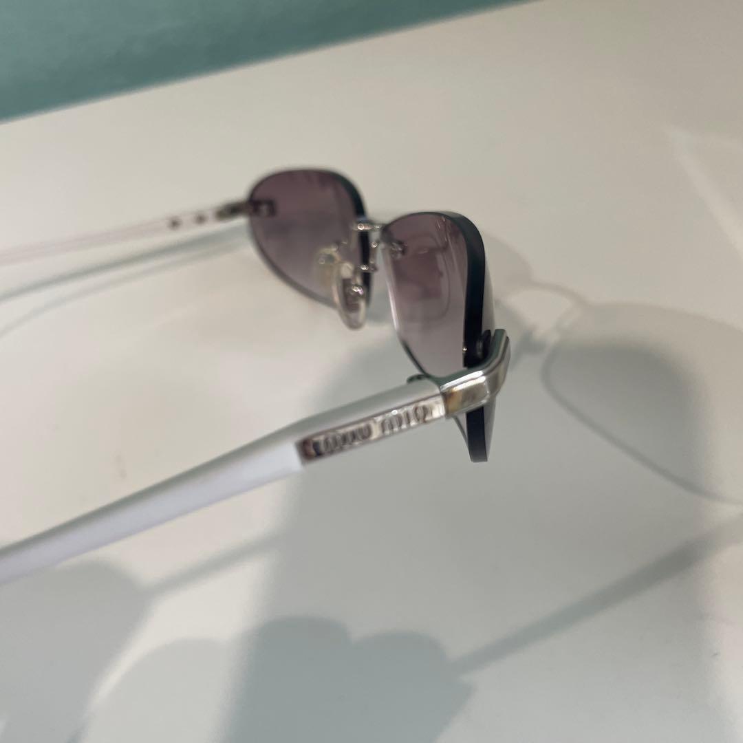 MIU MIU サングラス　紫色レンズ メタルフレーム ケース付き