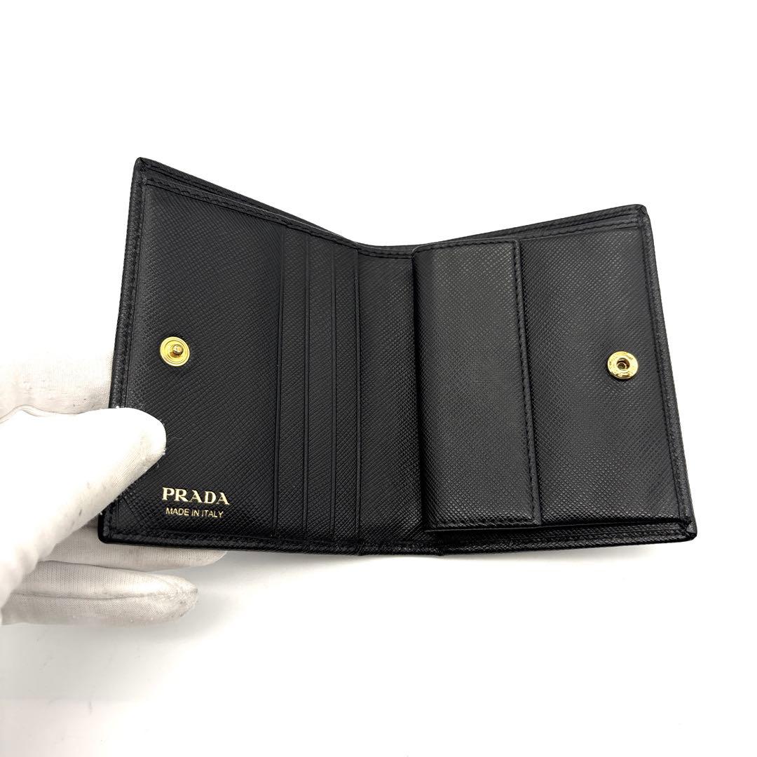 極美品◆PRADA 二つ折り財布 サフィアーノ レザー ゴールドロゴ 黒