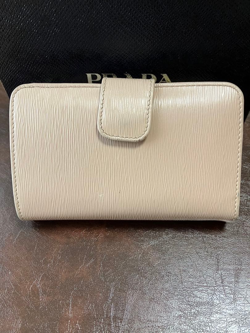 PRADA VITELLO MOVE 二つ折り財布 ピンクベージュ 1ML225