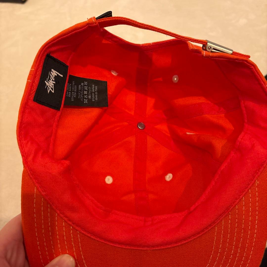 STUSSY オレンジキャップ