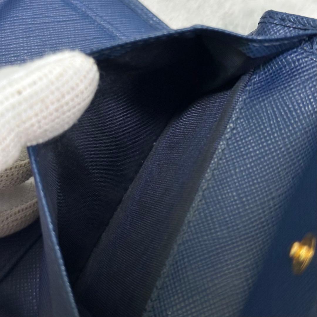 PRADA プラダ　折り財布　リボン　ゴールドロゴ ブルー　サフィアーノレザー