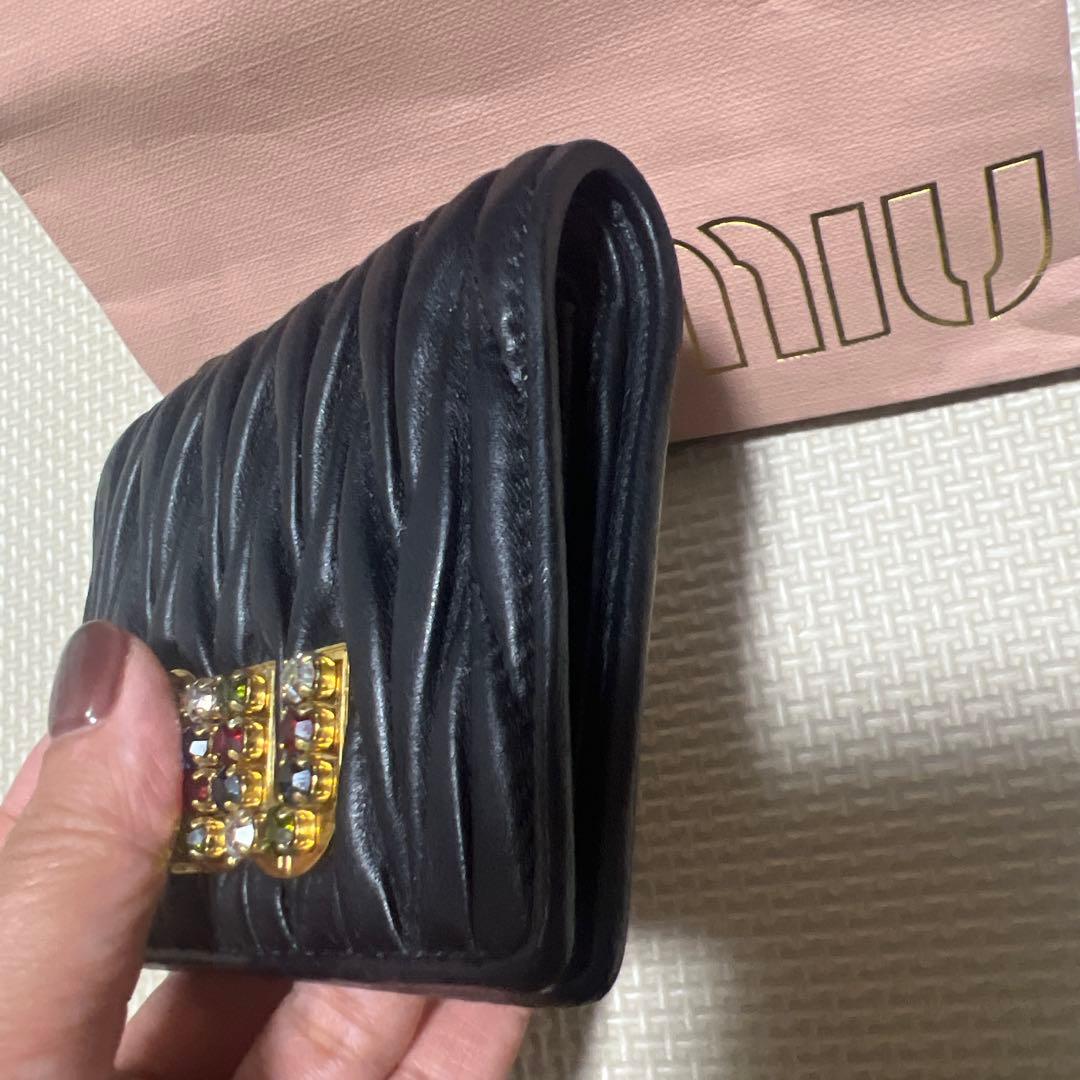 MIU MIU ブラック 二つ折り財布　マトラッセ