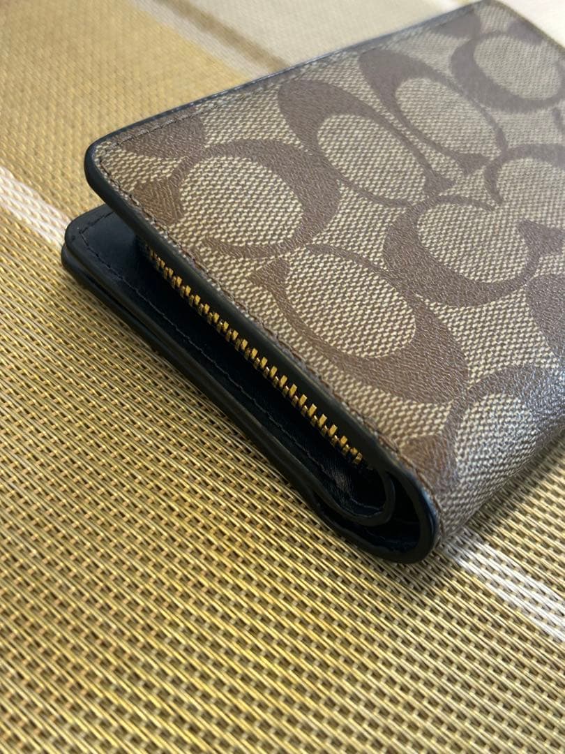 新品未使用 COACH コーチ 二つ折り財布 ベージュ シグネチャー