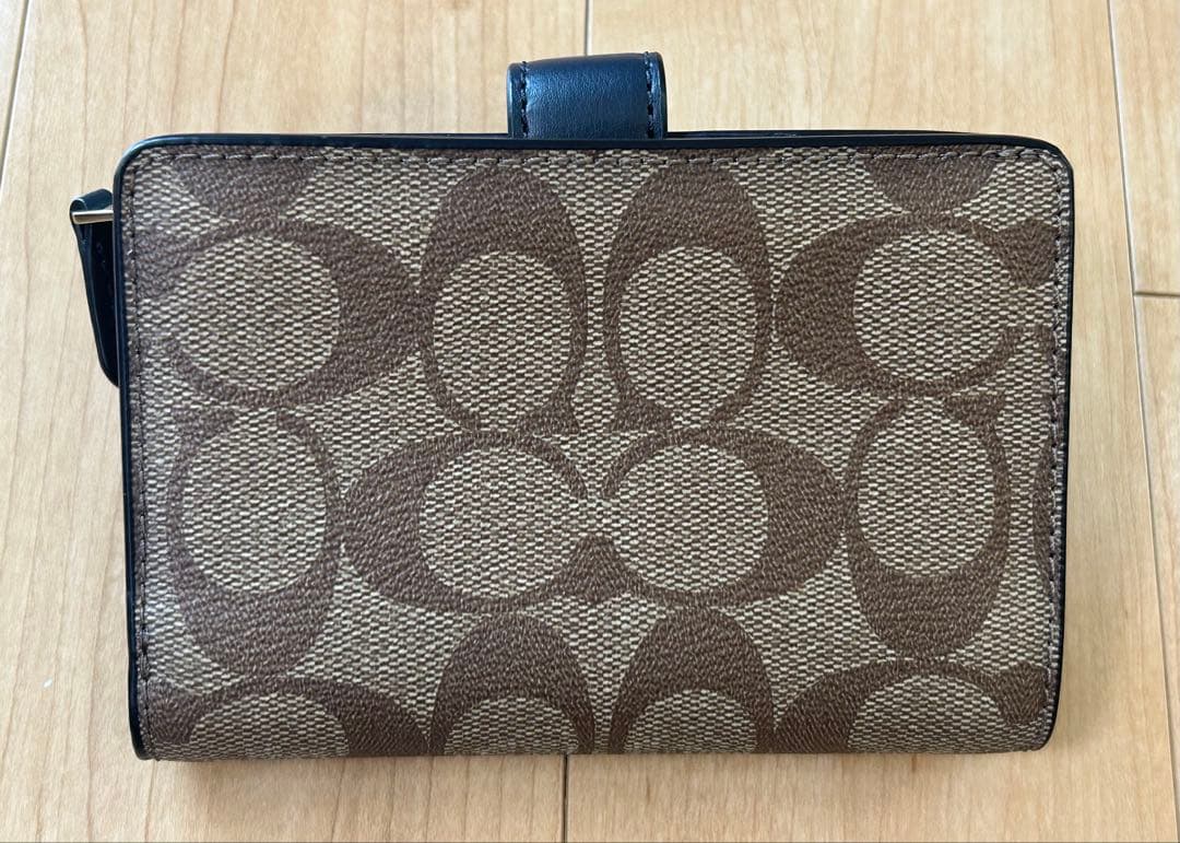 新品未使用 COACH コーチ 二つ折り財布 ベージュ シグネチャー