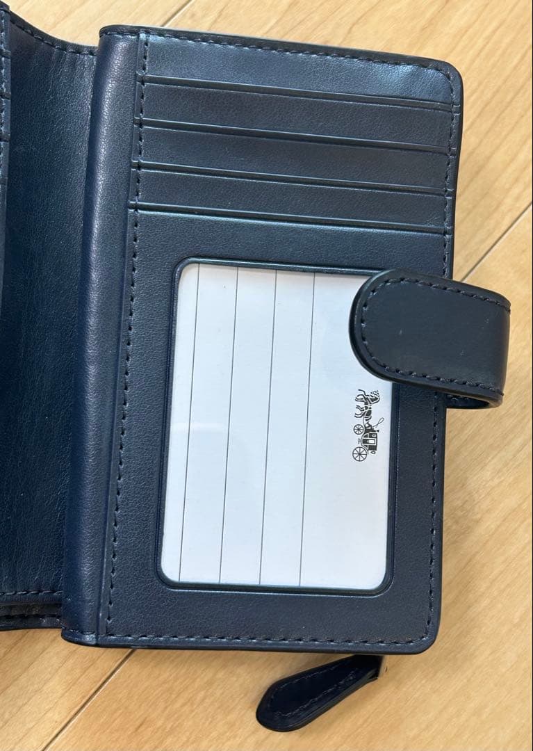 新品未使用 COACH コーチ 二つ折り財布 ベージュ シグネチャー