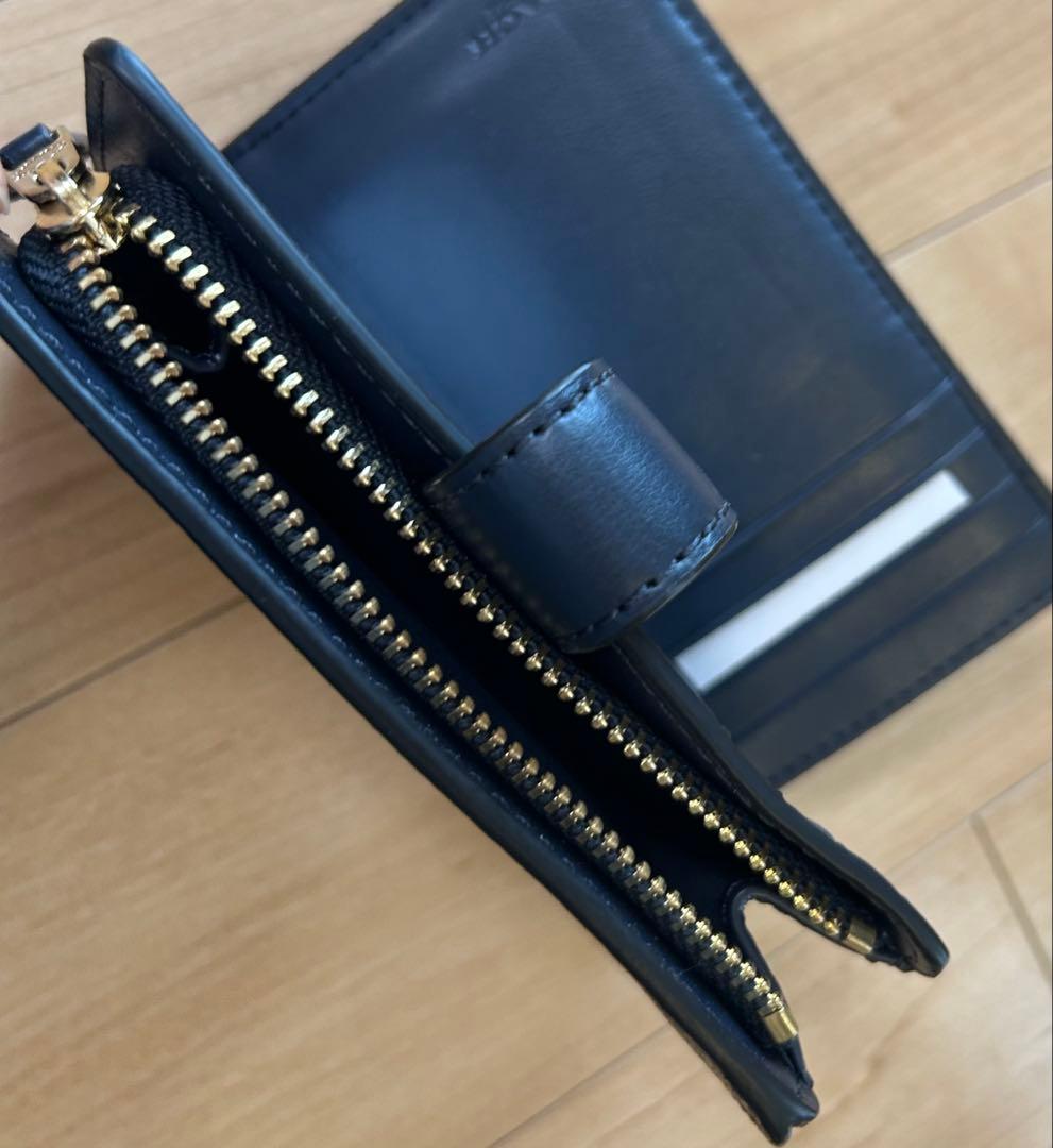 新品未使用 COACH コーチ 二つ折り財布 ベージュ シグネチャー