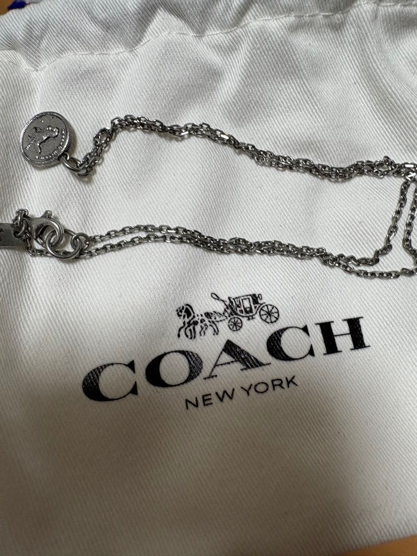 COACH シルバー型ネックレス　恐竜