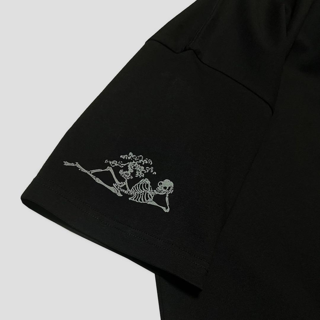 トップス NOMADIK 777 GANJI SKULL KURO TEE