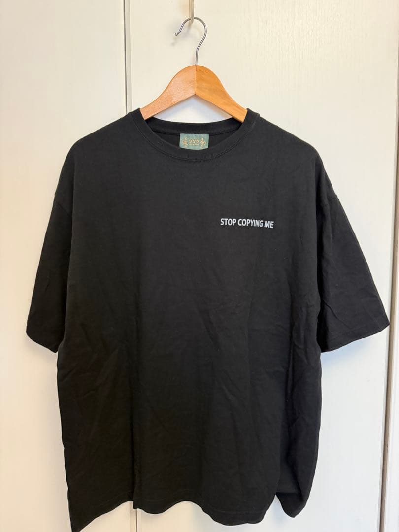 トップス NOMADIK 777 GANJI SKULL KURO TEE