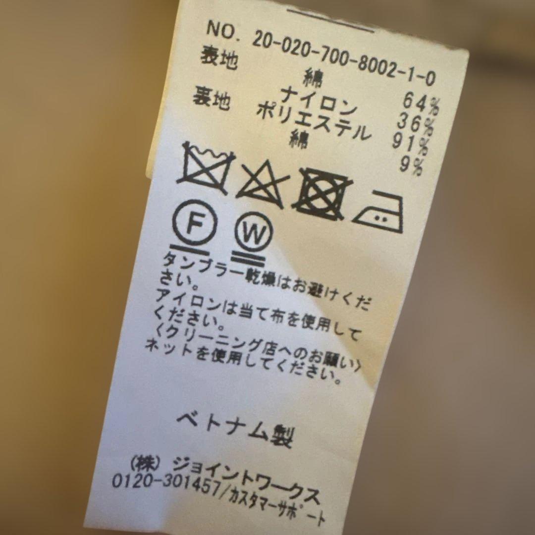 タグ付きシンプリシテェSIMPLICITEスプリングコートノーカラーロングコート