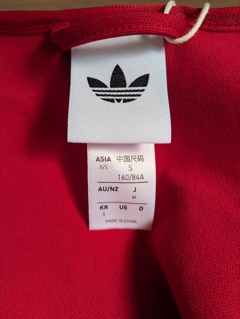 adidas Originalsエレベーテッド スリーブFBトラックトップ