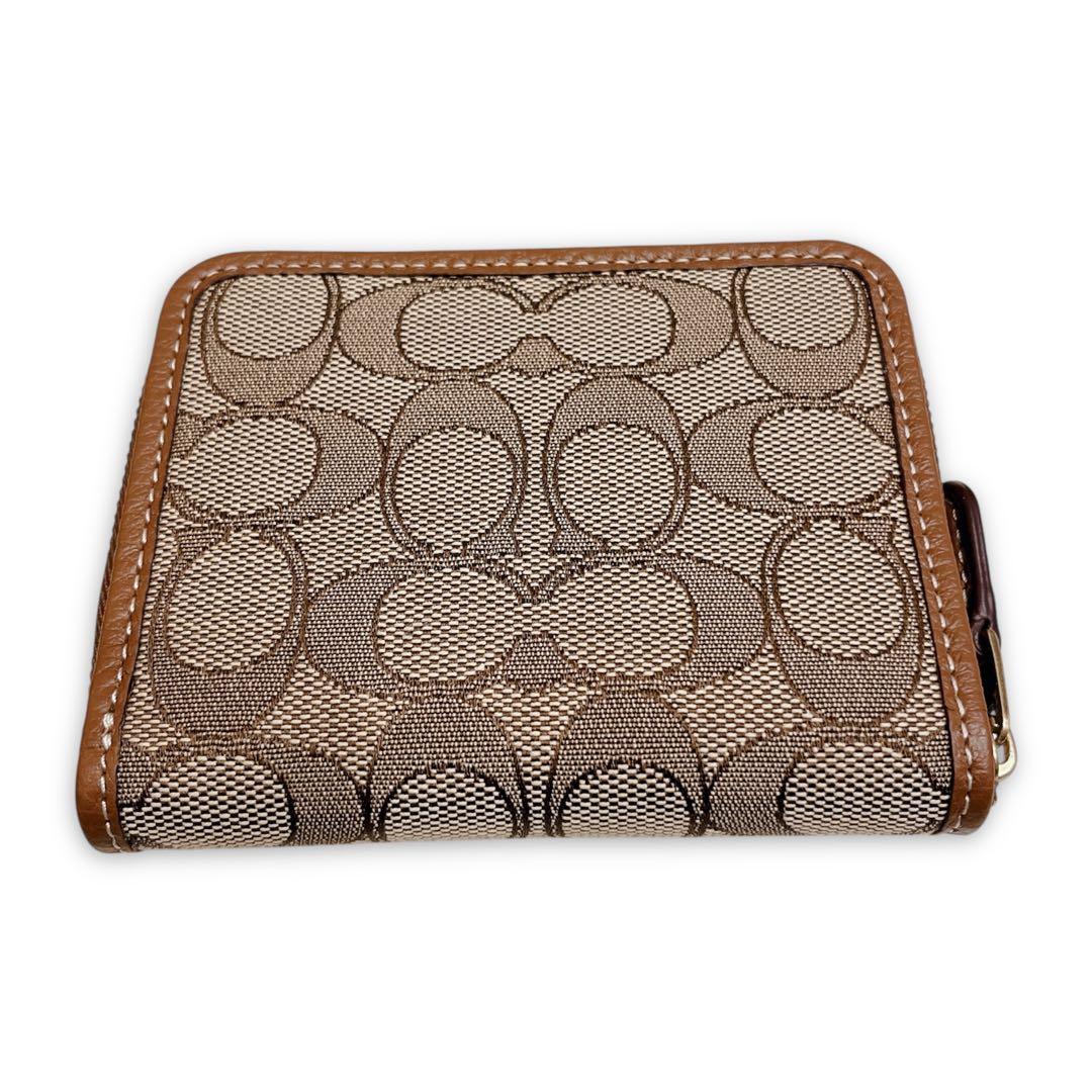 【新品】COACH Disney 二つ折り財布 刺繍 シグネチャー 二つ折り