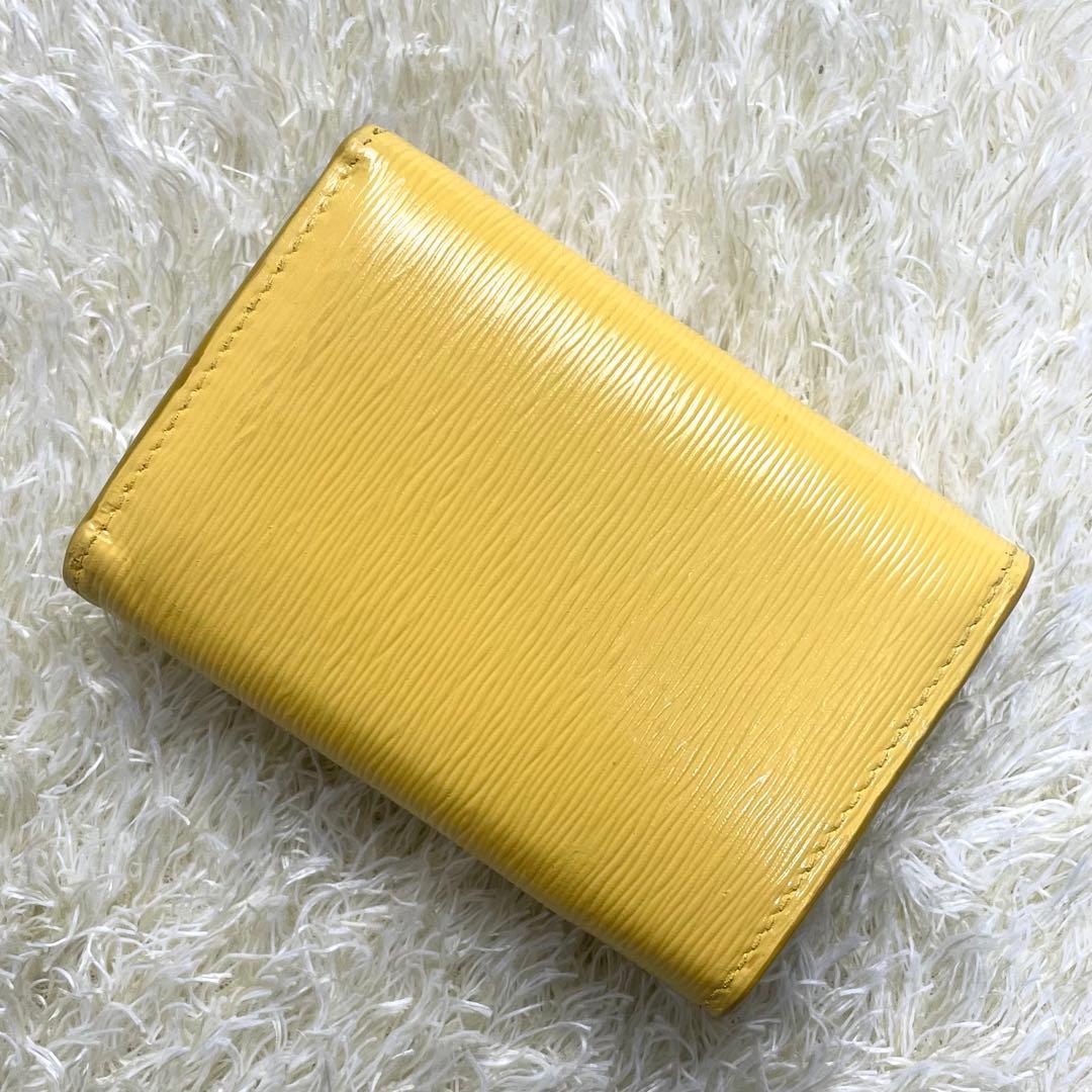 極美品 プラダ ヴィッテロムーブ 三つ折り財布 メタルロゴ イエロー