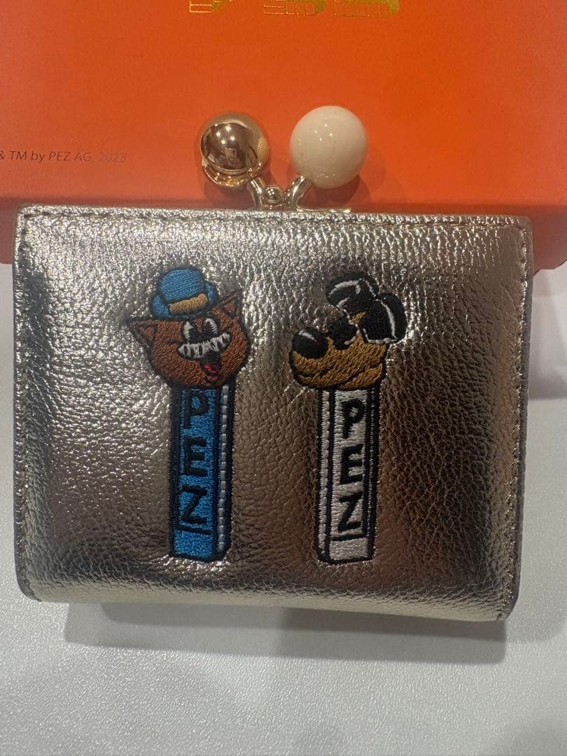 megoo　【PEZ(ペッツ) ×ear】本革/コラボ三つ折りがま口財布