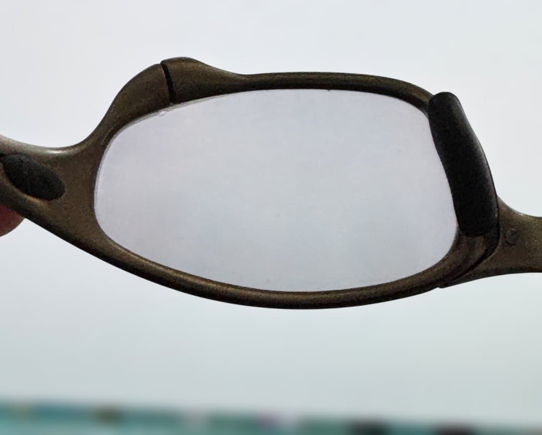 最終【お買得】Oakley Juliet ファイヤーイリジウム+偏光レンズ付き