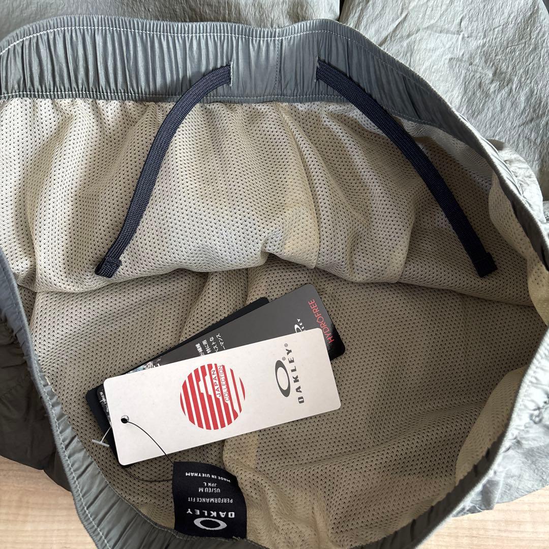 新品　オークリー　メンズ　ライフスタイルウェア　撥水　防風　裏メッシュ　L