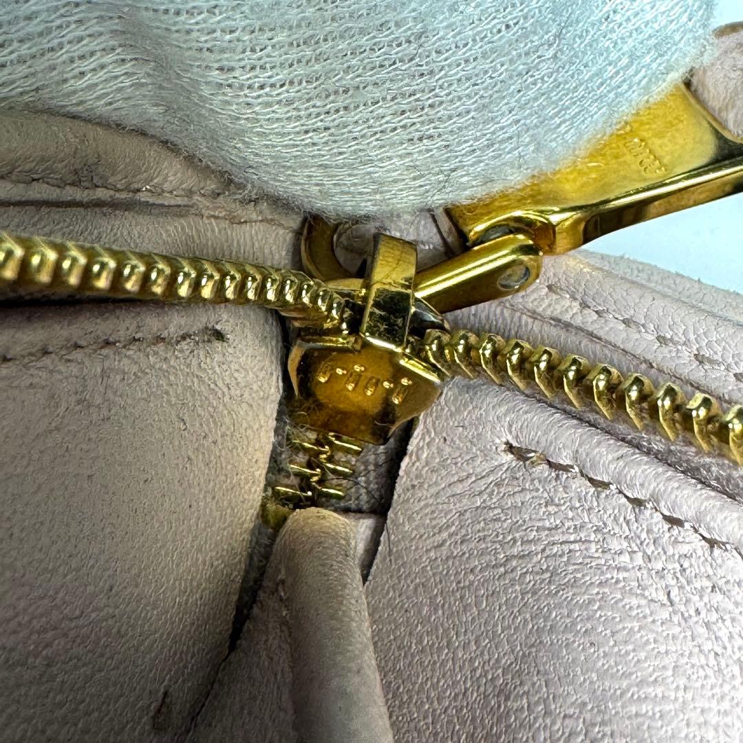 ミュウミュウ 折り財布 マテラッセ ロゴ金具 ビジュー クリスタル ピンク