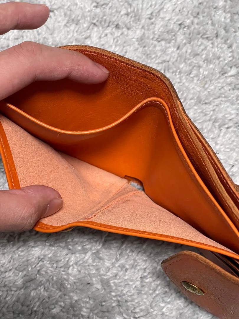 オレンジ レザー 二つ折り財布