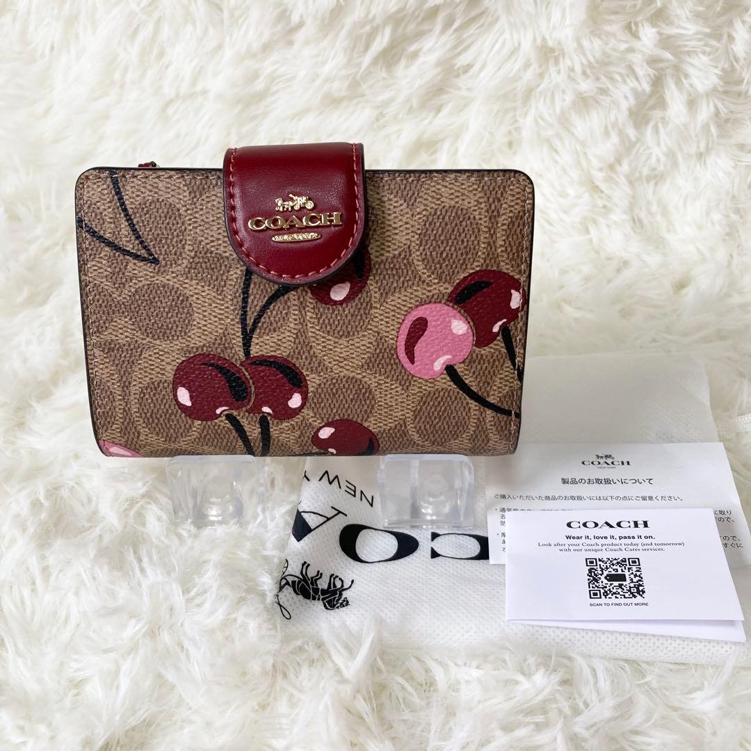 COACH コーチ シグネチャー チェリー柄 二つ折り財布
