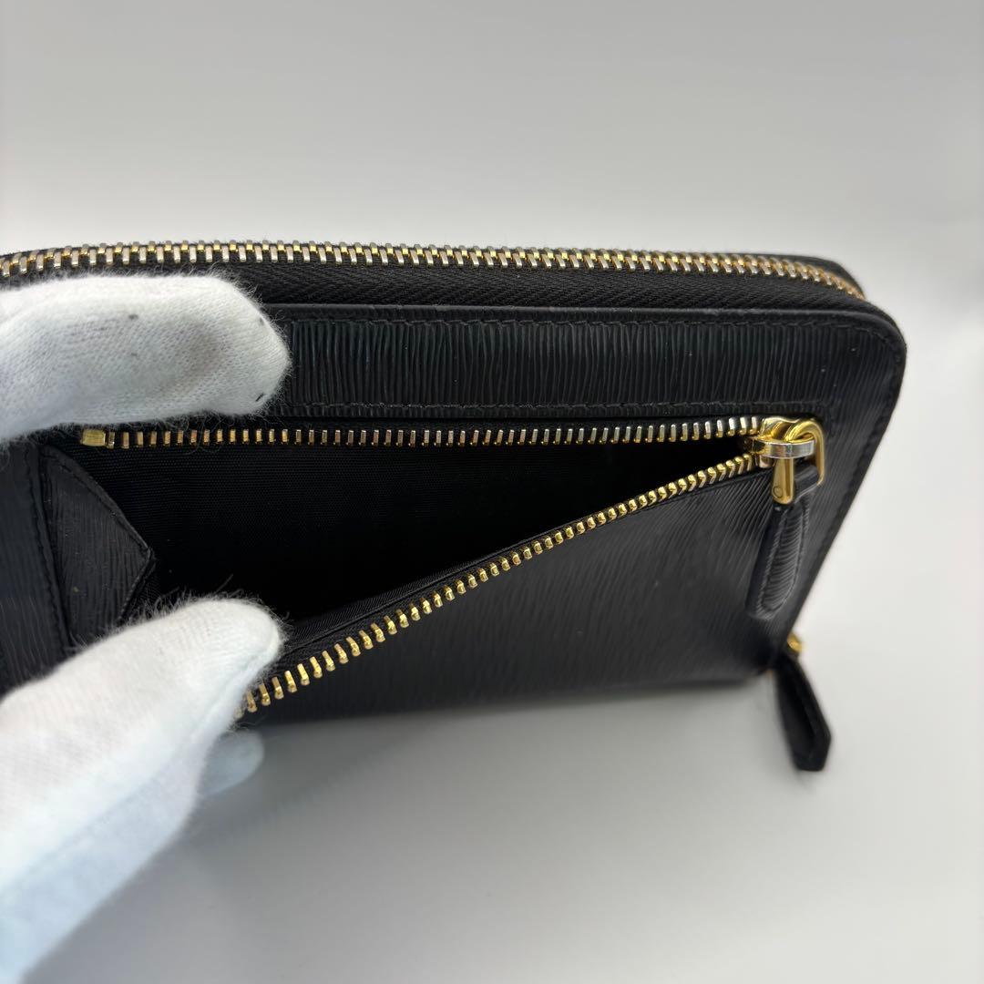 PRADA ラウンドジップ　ミディアムウォレット　1ML157 ヴィッテロムーブ