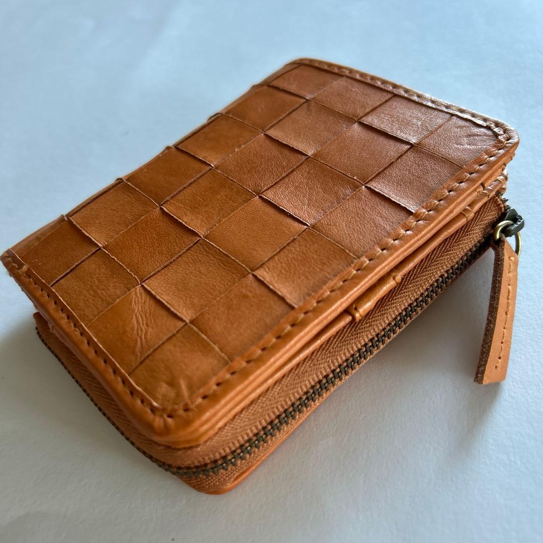 ♡zucchero filato ☆編み込みデザインが素敵な折り財布(牛革)