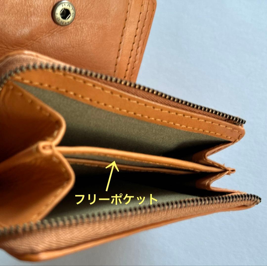♡zucchero filato ☆編み込みデザインが素敵な折り財布(牛革)