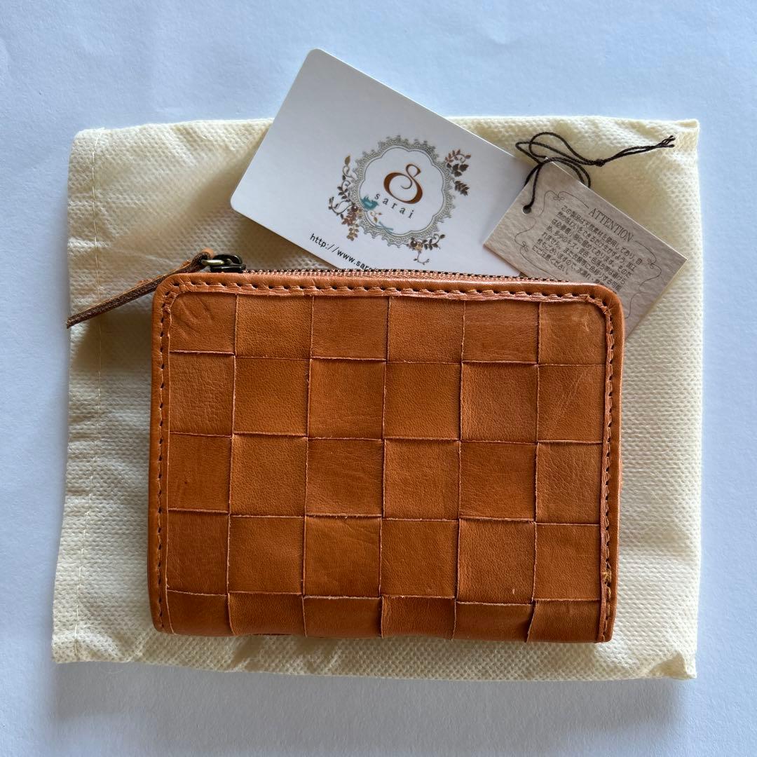 ♡zucchero filato ☆編み込みデザインが素敵な折り財布(牛革)