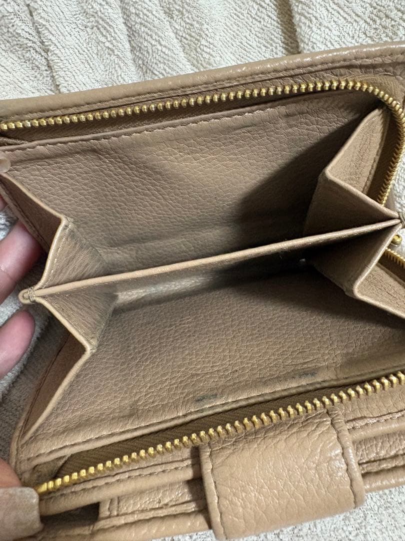 PRADA 二つ折り財布 ベージュ レザー