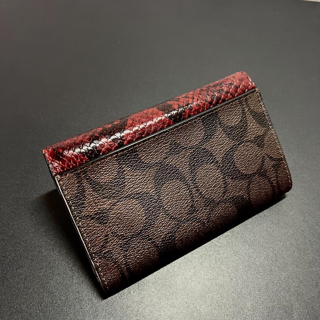 正規品＆美品‼️ コーチ パイソン シグネーチャー 三つ折り財布 ワインレッド