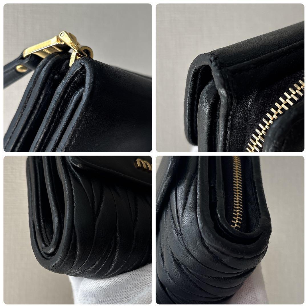 希少✨ミュウミュウ 二つ折り財布 マテラッセ ロゴ金具 レザー ブラック