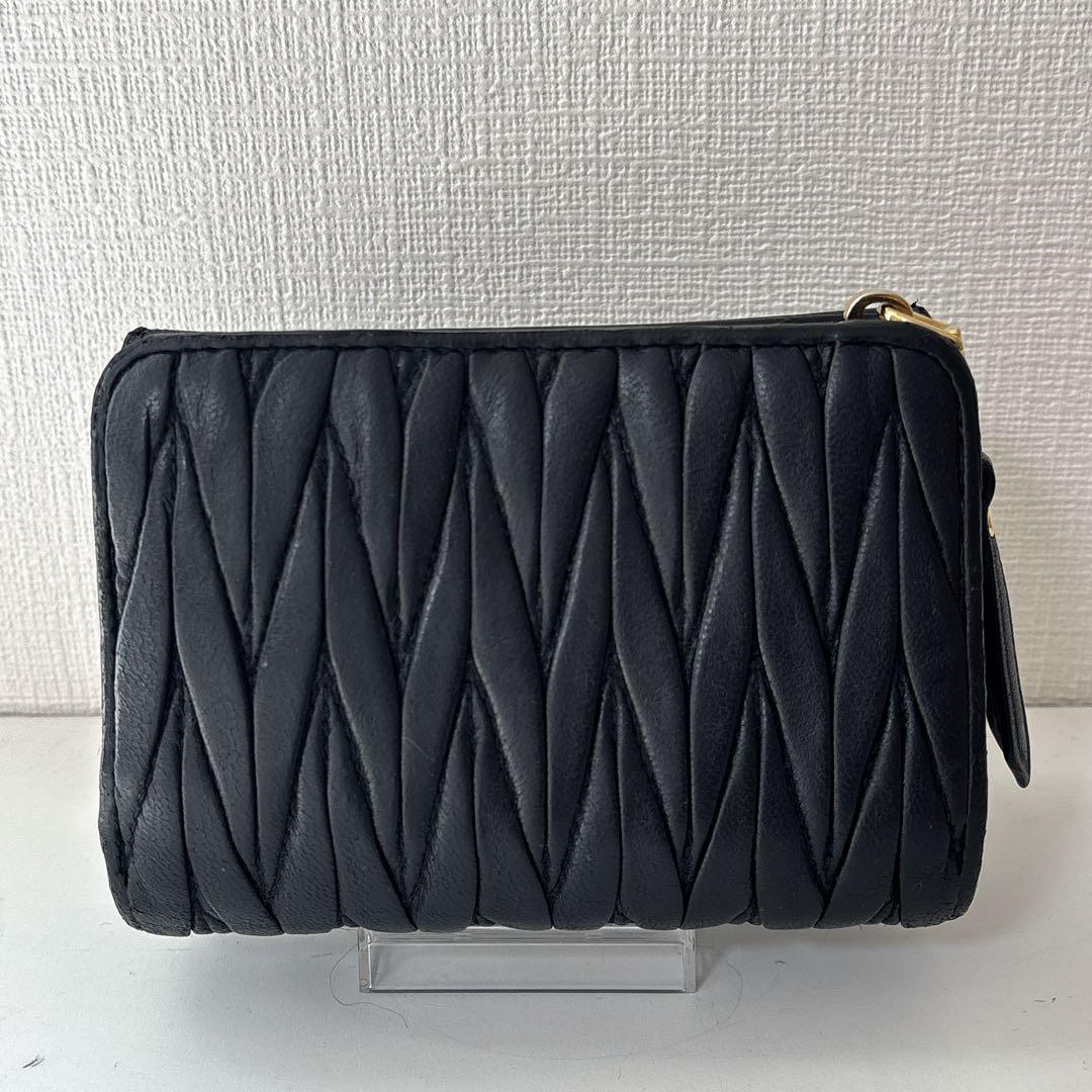 希少✨ミュウミュウ 二つ折り財布 マテラッセ ロゴ金具 レザー ブラック