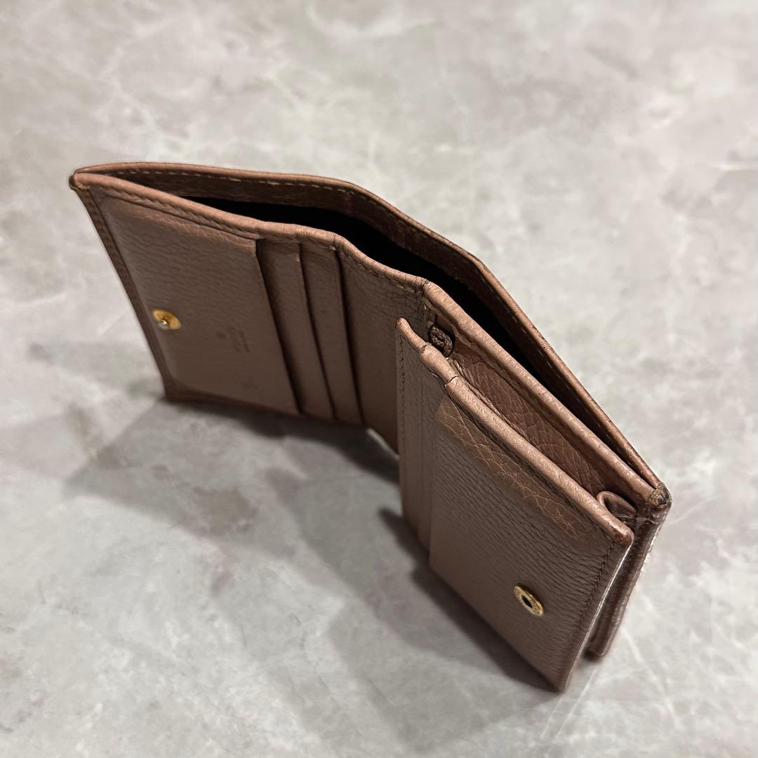 Gucci ベージュ 二つ折り財布 GGロゴ付き