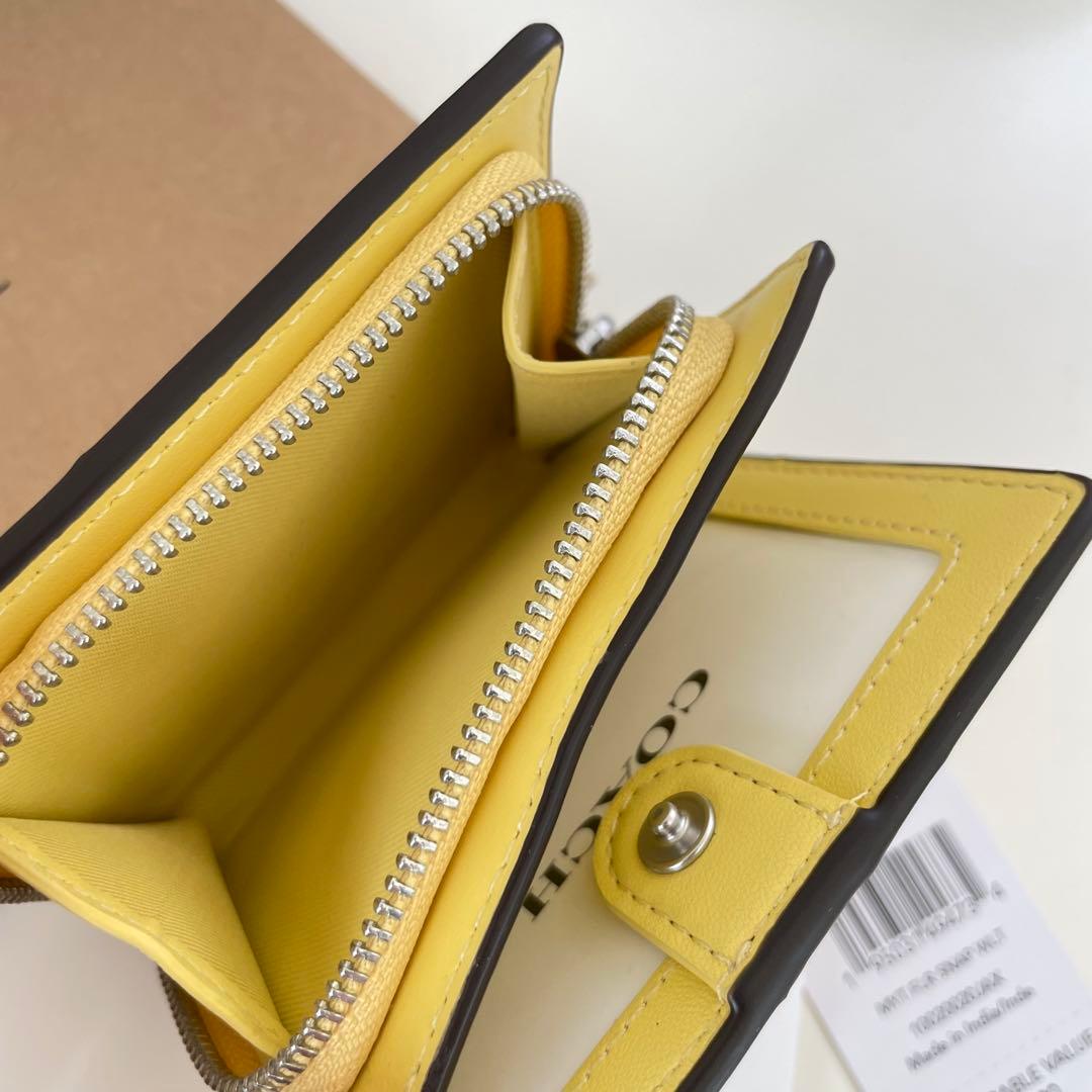 COACH コーチ　折り財布　イエロー　黄色　花柄　ミニウォレット
