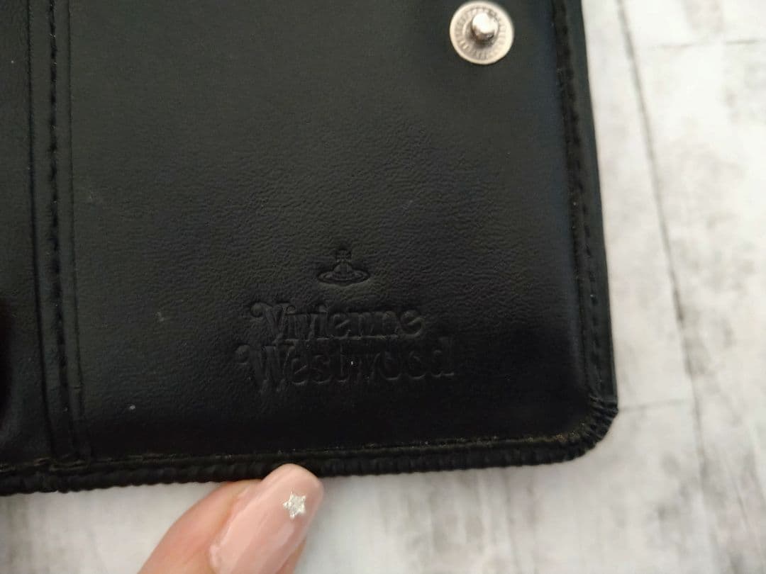 【人気】Vivienne Westwood がま口 二つ折り財布 オーブロゴ