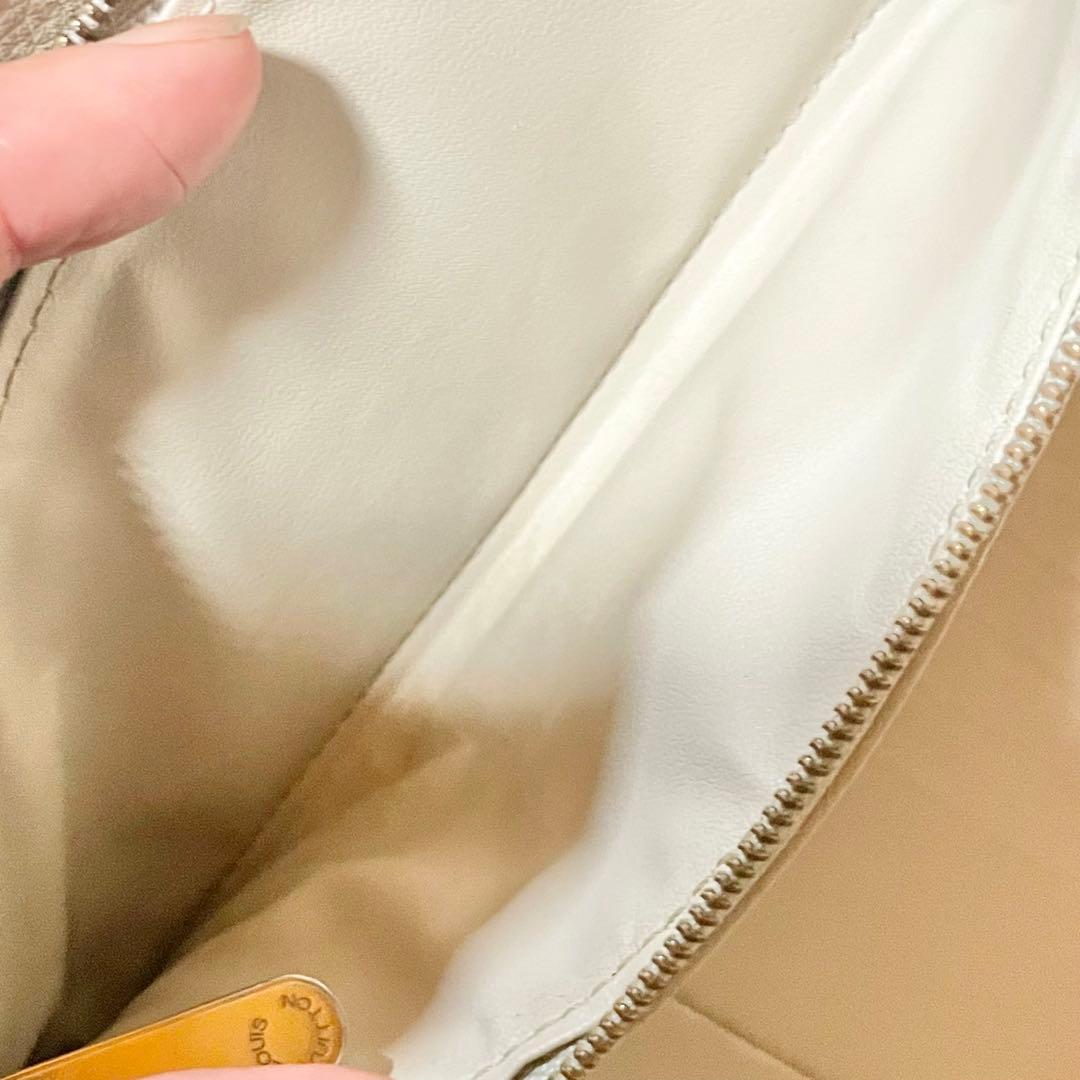 【至高の逸品】LOUIS VUITTONマヒナポルトフォイユアメリア三つ折り財布