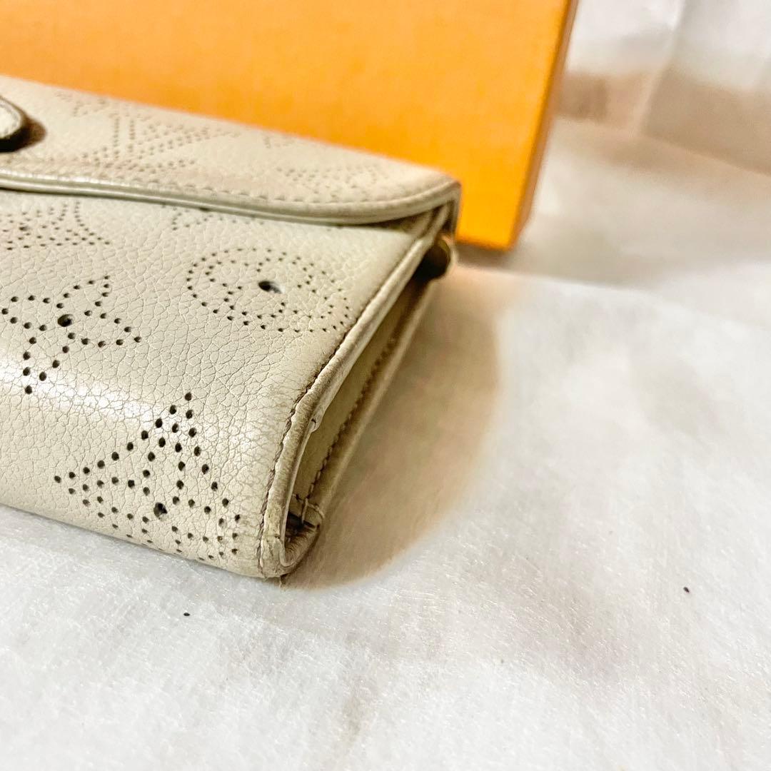 【至高の逸品】LOUIS VUITTONマヒナポルトフォイユアメリア三つ折り財布